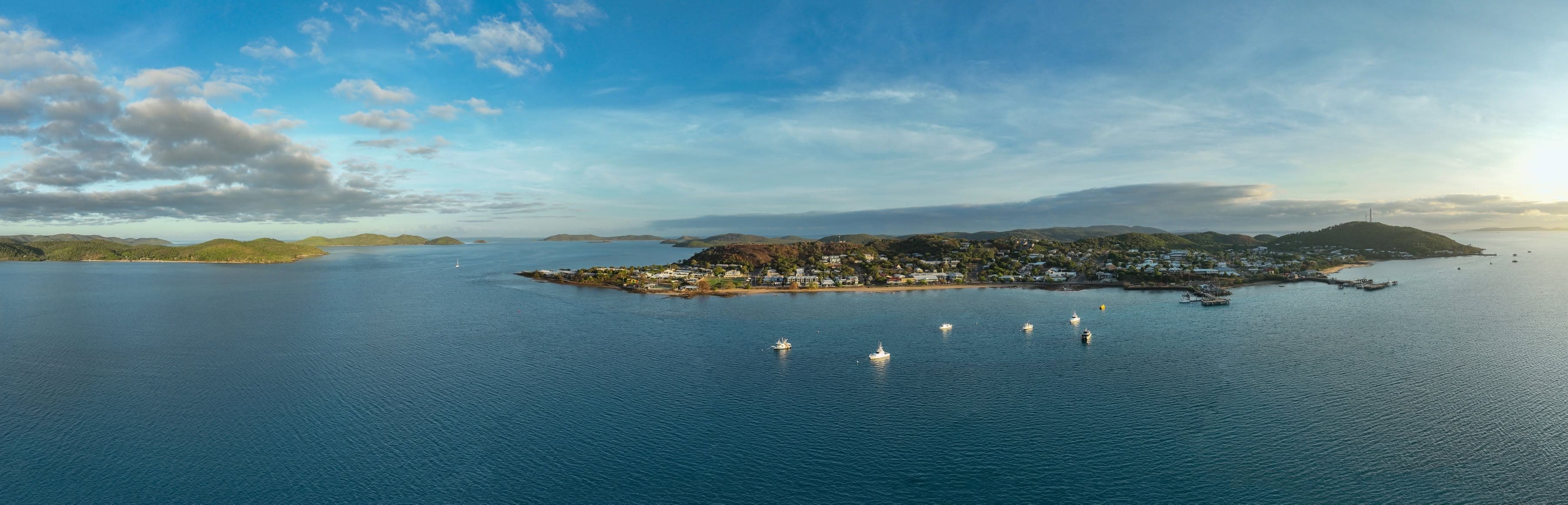 Aerial panorama of a coastal township in the Torres Strait